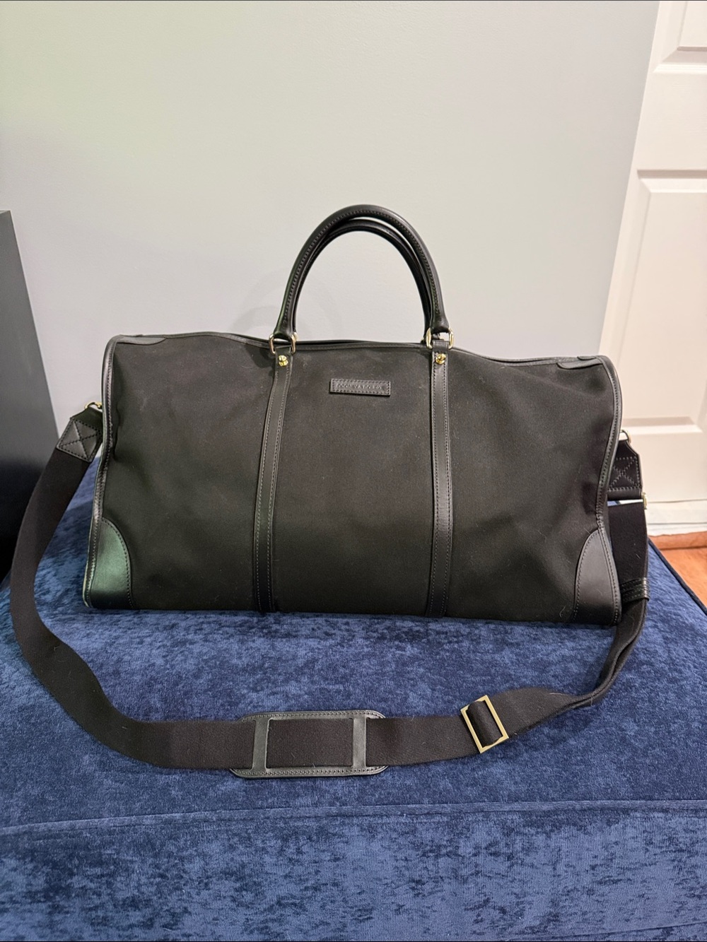 Dooney & Bourke Black Canvas Duffel with Leather Trim